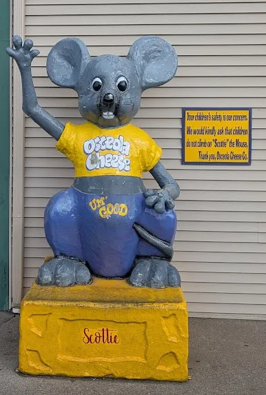 Osceola Cheese Company Mascot Scottie